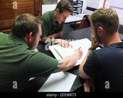Team members planning their next project. Stock Photo