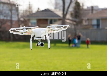 DJI phantom drone flying in the wind Stock Photo