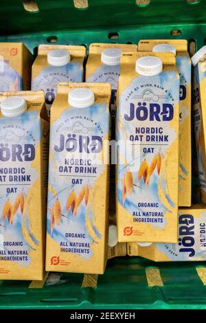 A crate of Jord Nordic Oat Milk drink cartons, an organic, non-dairy milk alternative, as part of food donations to a Trussell Trust foodbank. UK Stock Photo