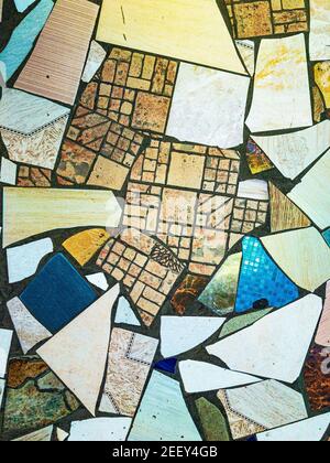Picasso abstractions style, grunge background with the wild chaotic broken mosaic ceramic tiles Stock Photo
