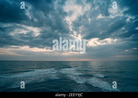 Ocean Dramatic Seascape Panorama in cloudy day, endless sea view till horizon. Stock Photo