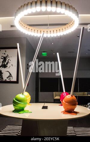 A sculpture of palettes of different colors on a table Stock Photo