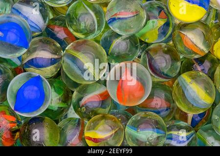 Full image of glass multi coloured marbles. Stock Photo