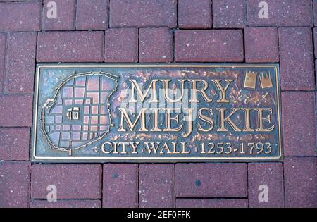 Poznan, wielkopolskie/Poland; 31.08.2019: City Wall 1253-1793 Poznan, stone embedded in the city pavement Stock Photo