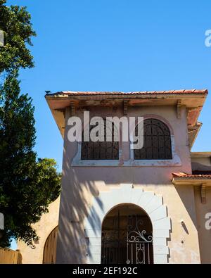 Image displaying typical Caribbean architecture with blue sky Stock Photo
