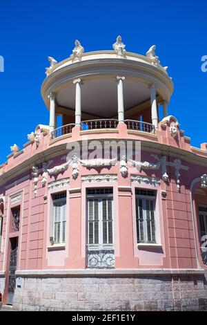 Image displaying typical Caribbean architecture with blue sky