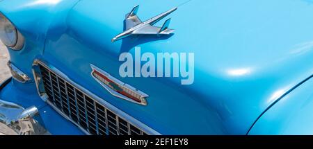 Havana, Cuba - 26 July 2018: Looking down at the front of a light blue 1050's Chevrolet Belair with its iconic hood ornament.in Havana Cuba. Stock Photo