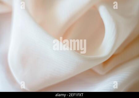 Textile and texture concept - close up of crumpled fabric background. Abstract background, empty template. Top view. Stock Photo