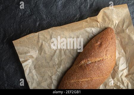 Close up photo British Baton loaf bread on paper Stock Photo