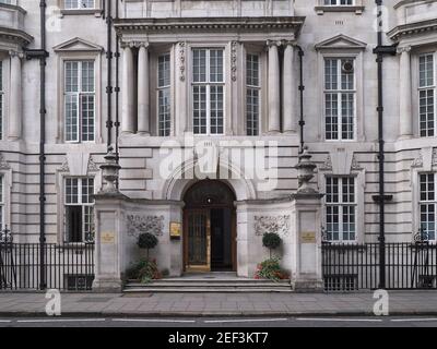 London, UK - September 27, 2016:  In the Mayfair district in Grosvenor Square, an elegant stone building that was originally a single mansion, and lat Stock Photo