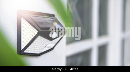 Small solar powered led light with sun light Stock Photo