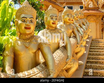 Temple guardians at Wat Kean Kliang, a Buddhist temple in Phnom Penh, Cambodia, located between the Tonle Sap and Mekong rivers. Stock Photo