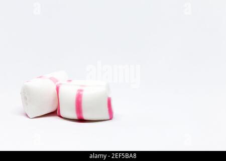 two little polka dots on white background Stock Photo