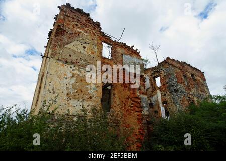 Ruined house in Open air museum of the Croatian War of Independence (1991-1995) in Karlovac, Croatia