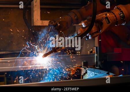 Welding robot, the process of welding a metal profile. Stock Photo