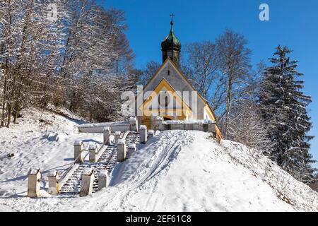 Chapel in winter in the snow in Poettmes, Bavaria, Germany Stock Photo