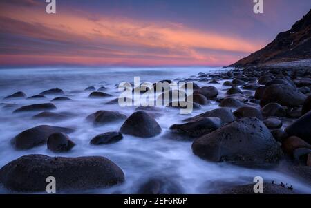 Winter sunrise in Unstad Beach (Lofoten, Norway) ESP: Amanecer invernal en la playa de Unstad (Lofoten, Noruega) Stock Photo