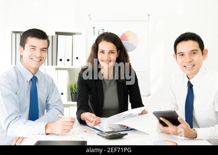 Group of multiethnic business people at the meeting table in the office Stock Photo