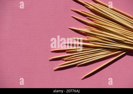toothpicks made of bamboo on pink background with clipping path and copyspace Stock Photo