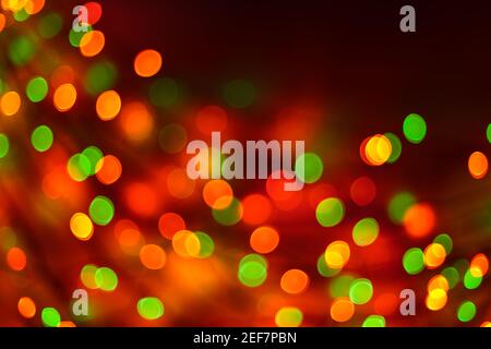 Red and green holiday bokeh abstract Christmas background Stock Photo