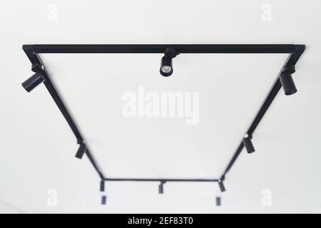 Modern LED black track lights in the interior Stock Photo