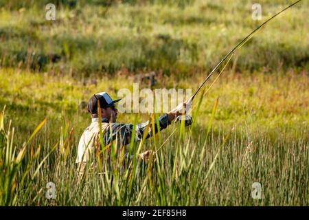 Gone Fishing. fisherman with fishing rod. happy man in cowboy hat