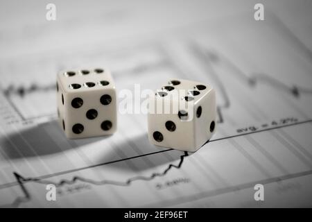 Close-up of a pair of dice on a sheet of paper Stock Photo