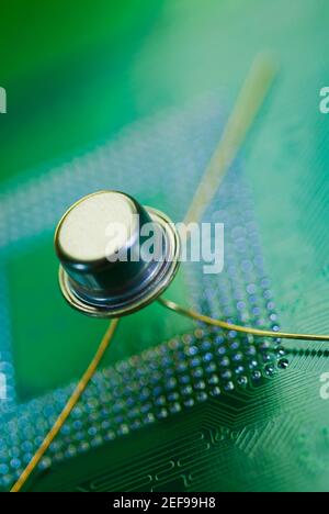 Close up of a transistor on a mother board Stock Photo