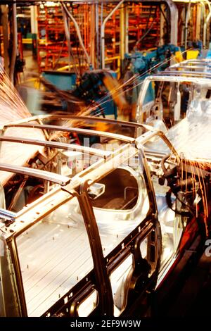 Robots welding a row of cars in an assembly line, Baltimore, Maryland, USA Stock Photo