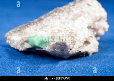 rough emeralds in granite Stock Photo