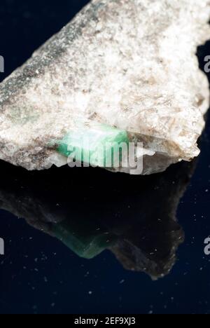 rough emeralds in granite Stock Photo