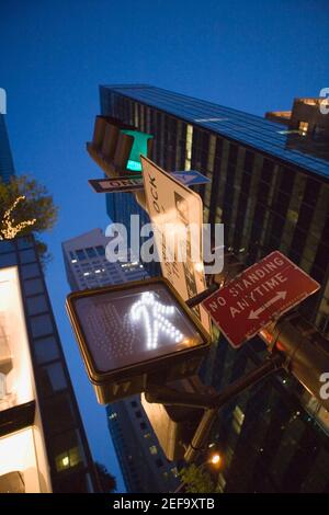 Low angle view of a walk signal at night Stock Photo