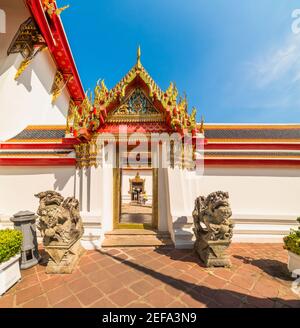 Golden and Red Gate Design. Architectonic Details within Grand Palace in Bangkok, Thailand Stock Photo