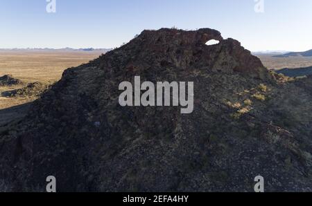 AGUILA, ARIZONA, UNITED STATES - Feb 06, 2021: The view of the north side of Eagle Eye Peak and arch on a sunny winter afternoon. Stock Photo