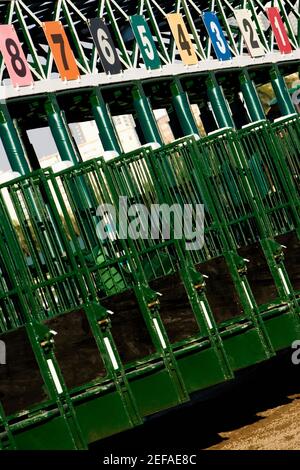 Empty starting gates at the horseracing track Stock Photo