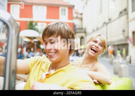 Young couple in a car Stock Photo