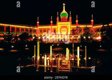 Facade of a mosque lit up at night, Tivoli Gardens, Copenhagen, Denmark Stock Photo