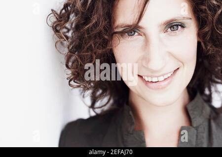 Close-up of a mid adult woman smiling Stock Photo