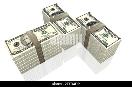High angle view of bundles of American ten dollar bills and one hundred dollar bills Stock Photo