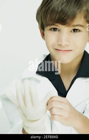 Portrait of a boy dressed as a doctor Stock Photo