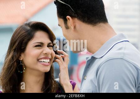 Close up of a couple looking at each other and smiling Stock Photo