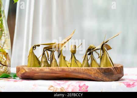 Sweet Stuffed Dough (Kanom Sai Sai), Thai traditional sweet dessert. Stock Photo