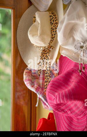 The wall hung various retro hats. And there is very colors in the photo. Stock Photo