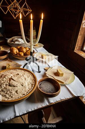 OSLO, NORWAY - December 01, 2019: Table set with traditional Norweigan foods. Cultural History Museum. Stock Photo