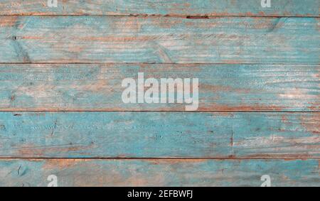 Grungy blue wooden boards with texture as background Stock Photo