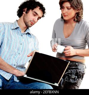 Young couple working on a laptop Stock Photo