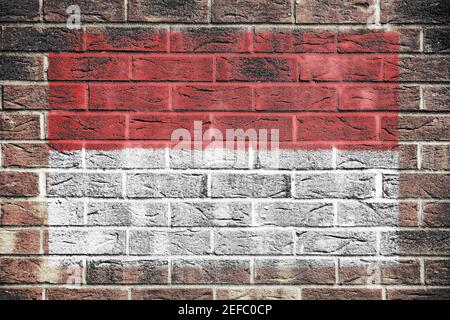 Indonesia flag painted on brick wall background Stock Photo