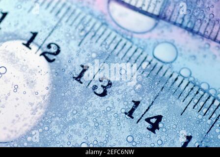 Close-up of a ruler in water Stock Photo