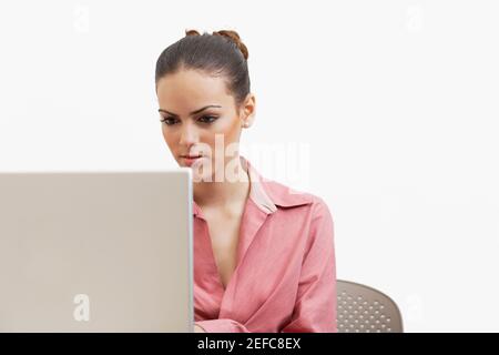 Close-up of a businesswoman using a laptop Stock Photo