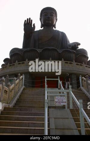 Low angle view of a statue of Buddha, Tian Tan Buddha, Po Lin Monastery, Ngong Ping, Lantau, Hong Kong, China Stock Photo